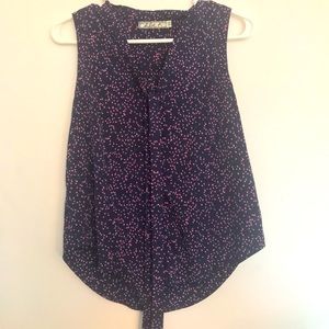 Polka dot pink and deep purple sleeveless blouse